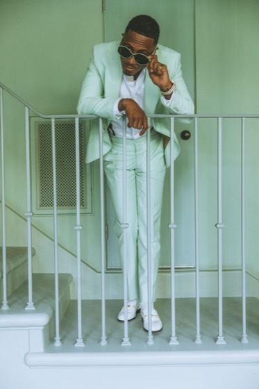 Personal brand portrait, mint suit and sunglasses
